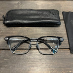 Classic vine-patterned black-rimmed glasses