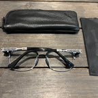 Classic vine-patterned black-rimmed glasses
