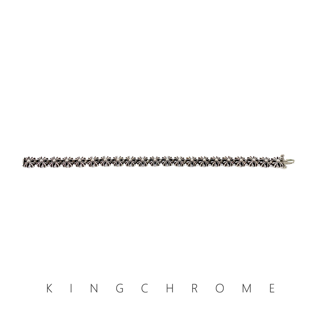 Cross-shaped flower insert bracelet