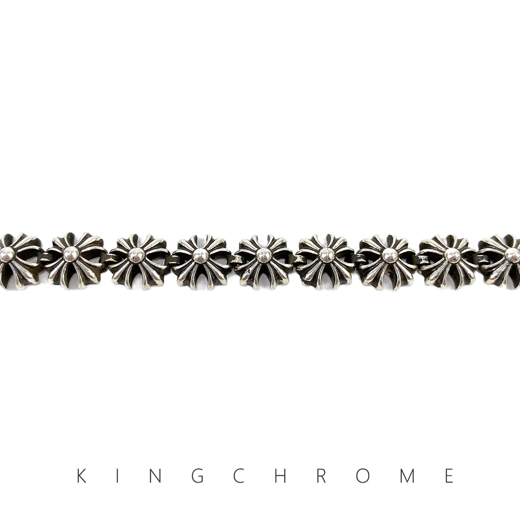 Cross-shaped flower insert bracelet