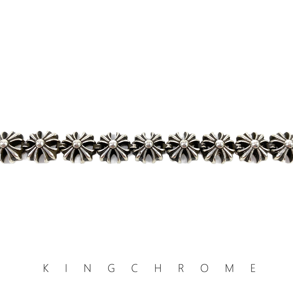 Cross-shaped flower insert bracelet