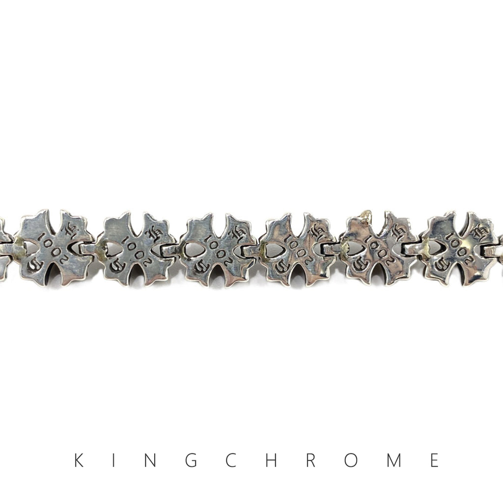 Cross-shaped flower insert bracelet