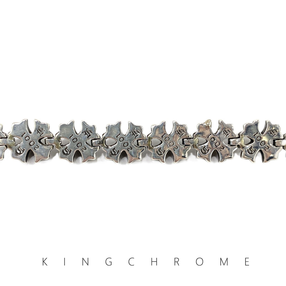 Cross-shaped flower insert bracelet