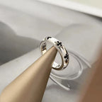 Aperture Concave Cross-Flower Ring